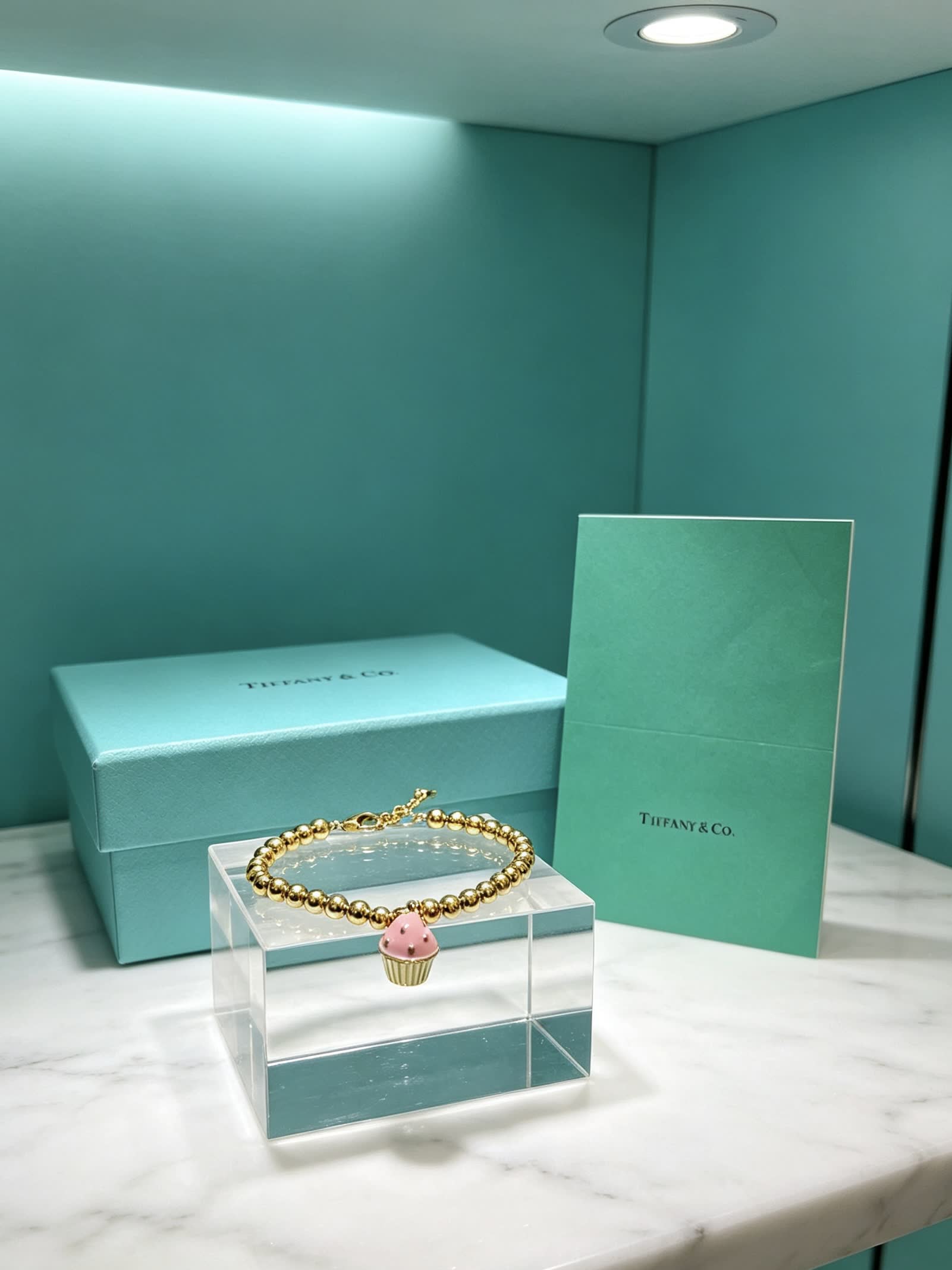 Tiffany & Co. Gold Bead Bracelet with Cupcake Charm